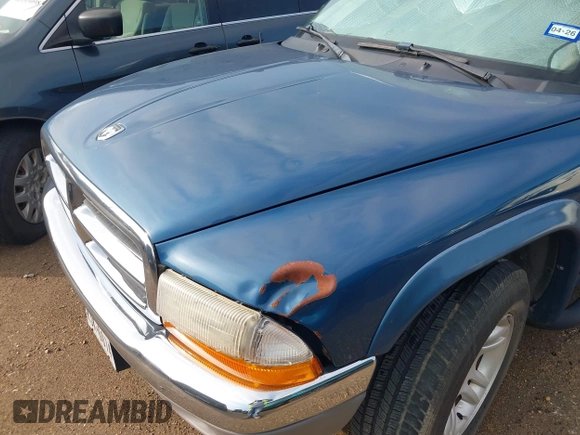 2003 Dodge Dakota SLT with VIN 1D7HL42N93S196397, listed as a IAAI auction lot 42105857 with 159,690 mi miles. Bid and sale history available at carsss.com. Image 6.