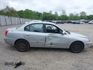 2004 Hyundai Elantra GLS z VIN KMHDN46D14U790939, wystawiony jako IAAI lot #42194909 z przebiegiem 108 180 mil mil oraz . Historia ofert i sprzedaży dostępna na DreamBid. Obrazek 13.