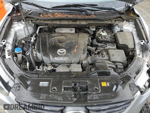 2016 Mazda CX-5 Sport z VIN JM3KE4BY5G0726376, wystawiony jako Copart lot #52009995 z przebiegiem 113 533 mil mil oraz Szkoda całkowita • Salvage title. Historia ofert i sprzedaży dostępna na DreamBid. Obrazek 14.