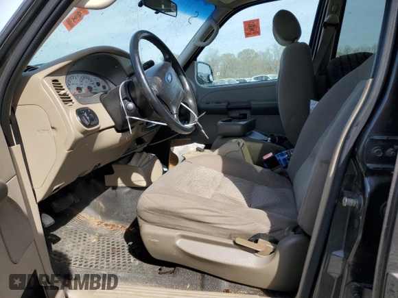 2005 Ford Explorer Sport Trac XLS z VIN 1FMZU67K65UA70362, wystawiony jako Copart lot #50586995 z przebiegiem 207 077 mil mil oraz Szkoda całkowita • Salvage title. Historia ofert i sprzedaży dostępna na DreamBid. Obrazek 7.