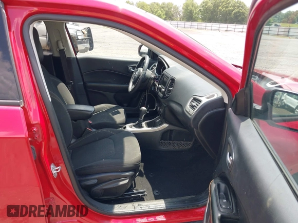 2018 Jeep Compass Sport z VIN 3C4NJCAB6JT487634, wystawiony jako IAAI lot #42405806 z przebiegiem 145 148 mil mil oraz . Historia ofert i sprzedaży dostępna na DreamBid. Obrazek 5.