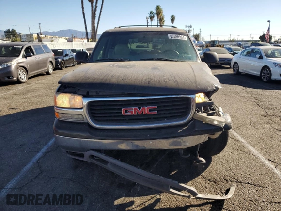 2001 GMC Yukon SLT z VIN 1GKEC13T41J148550, wystawiony jako Copart lot #80580964 z przebiegiem Nie podano mil oraz Szkoda całkowita • Salvage title. Historia ofert i sprzedaży dostępna na DreamBid. Obrazek 5.
