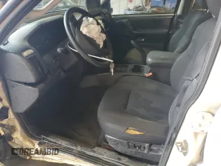 2004 Jeep Grand Cherokee Laredo z VIN 1J4GW48S74C165732, wystawiony jako Copart lot #56316885 z przebiegiem 177 139 mil mil oraz Szkoda całkowita • Salvage title. Historia ofert i sprzedaży dostępna na DreamBid. Obrazek 7.