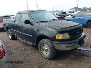 1998 Ford F-150 z VIN 1FTZX18W2WNB46784, wystawiony jako IAAI lot #42361562 z przebiegiem 145 786 mil mil oraz . Historia ofert i sprzedaży dostępna na DreamBid. Obrazek 1.