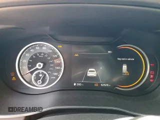 2022 Genesis G70 2.0T z VIN KMTG34TA3NU091204, wystawiony jako Copart lot #57073325 z przebiegiem 62 529 mil mil oraz Szkoda całkowita • Salvage title. Historia ofert i sprzedaży dostępna na DreamBid. Obrazek 9.