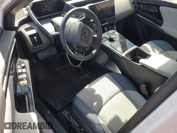 2023 Subaru Solterra Limited with VIN JTMABABA0PA004807, listed as a Copart auction lot 50586815 with 10,879 mi miles and Salvage Title. Bid and sale history available at DreamBid. Image 8.
