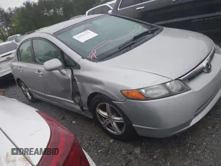 2006 Honda Civic LX with VIN 2HGFA16556H520894, listed as a IAAI auction lot 41963736 with 166,682 mi miles and . Bid and sale history available at DreamBid. Image 13.