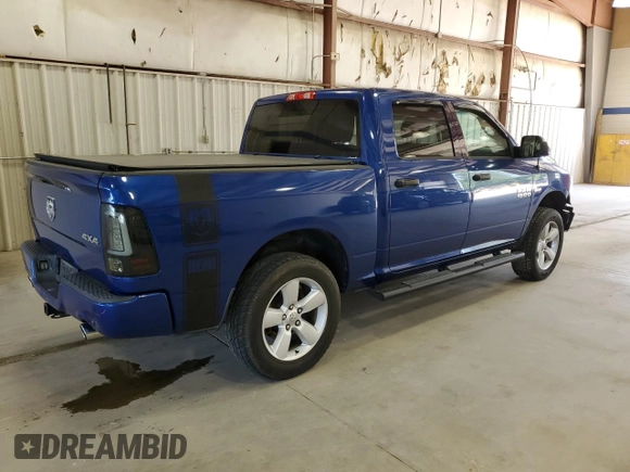 2014 Ram 1500 Express with VIN 3C6RR7KT4EG324804, listed as a Copart auction lot 58233005 with 103,306 mi miles and Salvage title. Bid and sale history available at DreamBid. Image 3.