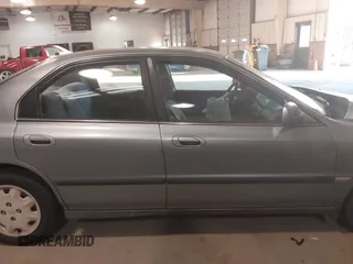 1996 Honda Accord LX with VIN 1HGCD563XTA141867, listed as a IAAI auction lot 41015252 with 420,800 mi miles and . Bid and sale history available at carsss.com. Image 13.