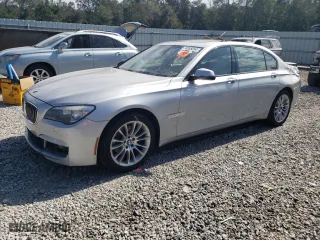 2013 BMW 7 Series 740Li with VIN WBAYE4C53DD136847, listed as a Copart auction lot 74855054 with 153,204 mi miles and Salvage Title. Bid and sale history available at carsss.com. Image 1.