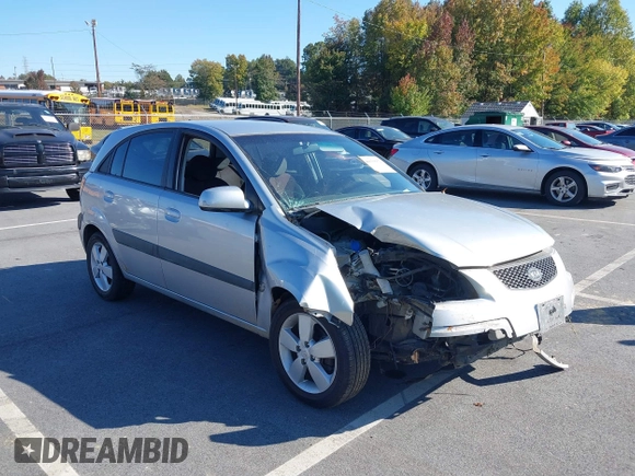 2009 Kia Rio LX with VIN KNADE243696547512, listed as a IAAI auction lot 40639932 with 204,809 mi miles. Bid and sale history available at carsss.com. Image 1.