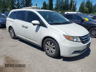 2015 Honda Odyssey EX-L z VIN 5FNRL5H63FB060322, wystawiony jako IAAI lot #42439240 z przebiegiem 174 743 mil mil oraz . Historia ofert i sprzedaży dostępna na DreamBid. Obrazek 1.