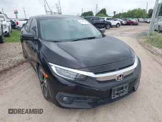 2016 Honda Civic EX-T with VIN 19XFC1F39GE029863, listed as a IAAI auction lot 42018040 with 100,610 mi miles and . Bid and sale history available at DreamBid. Image 1.