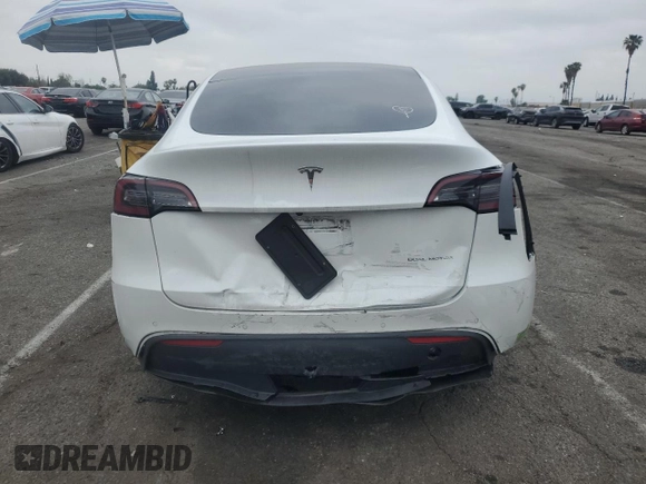 2023 Tesla Model Y Long Range with VIN 7SAYGDEE3PF583883, listed as a Copart auction lot 50920145 with 72,155 mi miles and Salvage Title. Bid and sale history available at DreamBid. Image 6.