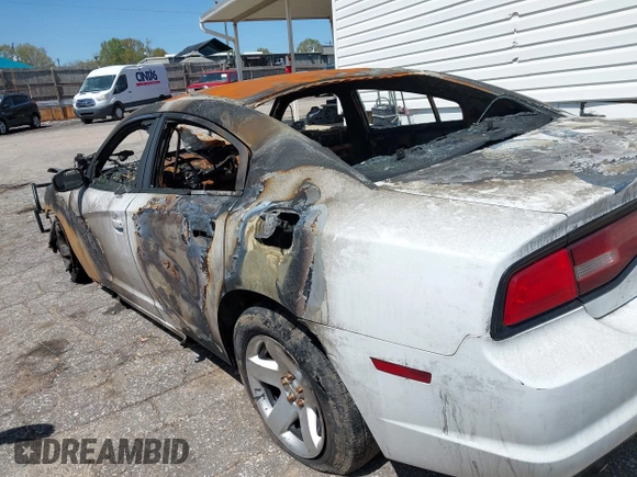 2014 Dodge Charger Police with VIN 2C3CDXAT0EH121251, listed as a IAAI auction lot 41940120 with Not Provided miles and . Bid and sale history available at DreamBid. Image 14.