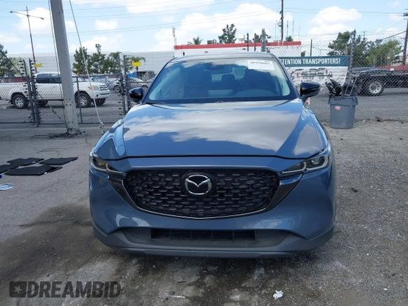 2023 Mazda CX-5 S Carbon Edition z VIN JM3KFBCM5P0179543, wystawiony jako IAAI lot #41950082 z przebiegiem 31 573 mil mil oraz . Historia ofert i sprzedaży dostępna na DreamBid. Obrazek 13.