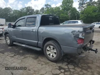 2017 Nissan Titan Platinum Reserve z VIN 1N6AA1E56HN571502, wystawiony jako Copart lot #56751155 z przebiegiem 105 017 mil mil oraz Szkoda całkowita • Salvage title. Historia ofert i sprzedaży dostępna na DreamBid. Obrazek 2.
