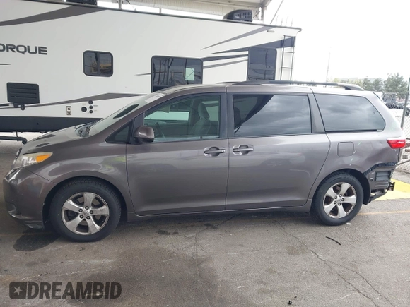 2015 Toyota Sienna LE AAS with VIN 5TDKK3DC8FS585957, listed as a IAAI auction lot 41888825 with 157,364 mi miles and . Bid and sale history available at DreamBid. Image 15.