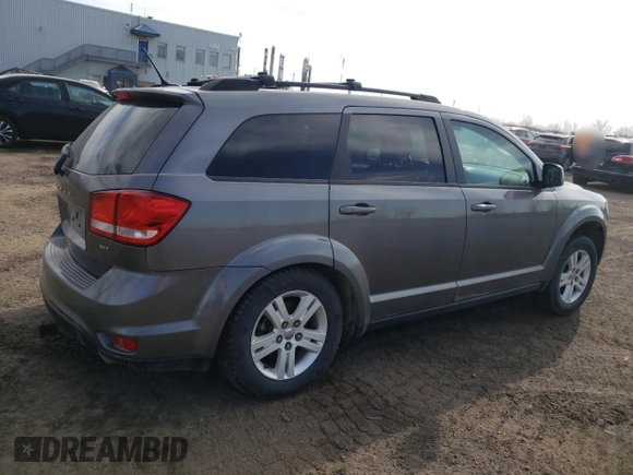 2012 Dodge Journey SXT z VIN 3C4PDCCGXCT177675, wystawiony jako Copart lot #52396045 z przebiegiem 168 203 mil mil oraz Szkoda całkowita • Salvage title. Historia ofert i sprzedaży dostępna na DreamBid. Obrazek 3.
