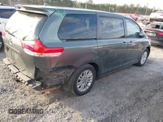 2012 Toyota Sienna XLE AAS with VIN 5TDYK3DC7CS276681, listed as a IAAI auction lot 41520303 with 183,511 mi miles and . Bid and sale history available at DreamBid. Image 4.