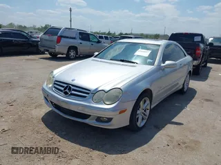 2007 Mercedes-Benz CLK 3.5L with VIN WDBTJ56H27F218970, listed as a IAAI auction lot 42054097 with 124,906 mi miles. Bid and sale history available at carsss.com. Image 2.