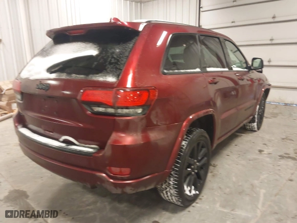 2018 Jeep Grand Cherokee Laredo E with VIN 1C4RJFAG9JC436803, listed as a IAAI auction lot 41572437 with 106,941 mi miles. Bid and sale history available at carsss.com. Image 4.