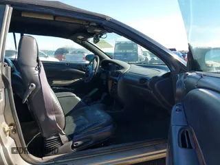 1999 Chrysler Sebring JXi with VIN 3C3EL55H8XT571486, listed as a IAAI auction lot 40755184 with 163,286 mi miles and . Bid and sale history available at DreamBid. Image 5.