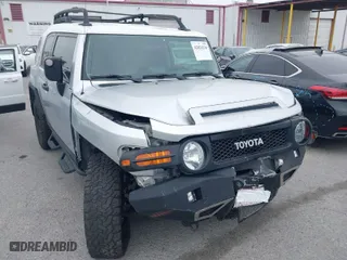 2007 Toyota FJ Cruiser with VIN JTEBU11F370036941, listed as a IAAI auction lot 42024330 with 164,703 mi miles. Bid and sale history available at carsss.com. Image 1.