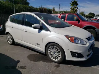 2016 Ford C-Max Energi SEL with VIN 1FADP5CUXGL115115, listed as a Copart auction lot 73226403 with 53,738 mi miles. Bid and sale history available at carsss.com. Image 4.