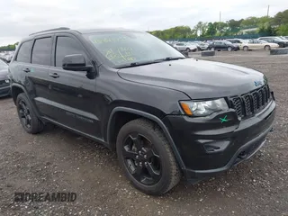 2018 Jeep Grand Cherokee Laredo with VIN 1C4RJFAGXJC502498, listed as a IAAI auction lot 42343738 with 81,600 mi miles and . Bid and sale history available at DreamBid. Image 1.