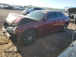 2012 Chrysler 300 S z VIN 2C3CCABG0CH313137, wystawiony jako Copart lot #57824175 z przebiegiem 170 071 mil mil oraz Szkoda całkowita • Salvage title. Historia ofert i sprzedaży dostępna na DreamBid. Obrazek 1.