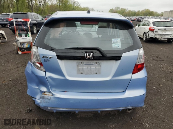 2009 Honda Fit Sport z VIN JHMGE88619S045049, wystawiony jako Copart lot #54223135 z przebiegiem 107 601 mil mil oraz Szkoda całkowita • Salvage title. Historia ofert i sprzedaży dostępna na DreamBid. Obrazek 6.