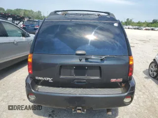 2003 GMC Envoy SLT with VIN 1GKET16S336137595, listed as a Copart auction lot 61498264 with Not Provided miles and Salvage Title. Bid and sale history available at DreamBid. Image 6.
