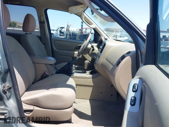 2005 Ford Escape XLT with VIN 1FMYU93175KC21568, listed as a IAAI auction lot 42581547 with 134,721 mi miles and . Bid and sale history available at DreamBid. Image 5.