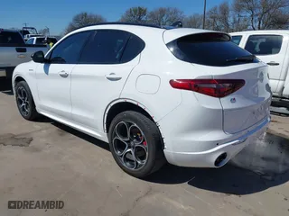 2023 Alfa Romeo Stelvio Ti with VIN ZASPAKBN4P7D63524, listed as a IAAI auction lot 41626631 with 37,731 mi miles. Bid and sale history available at carsss.com. Image 3.