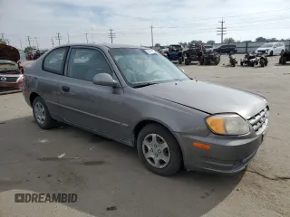 2004 Hyundai Accent GL with VIN KMHCG35C34U290855, listed as a Copart auction lot 70719664 with 176,210 mi miles and Salvage Title. Bid and sale history available at carsss.com. Image 4.