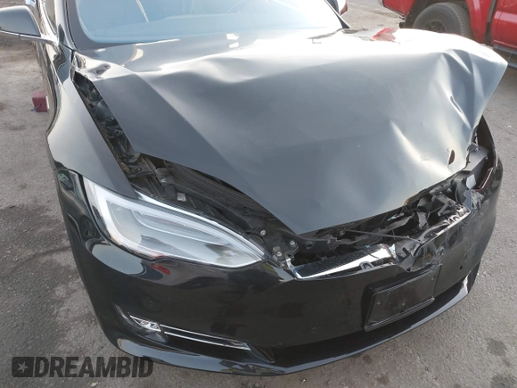 2016 Tesla Model S 90D z VIN 5YJSA1E26GF156108, wystawiony jako IAAI lot #41453148 z przebiegiem 74 717 mil mil oraz . Historia ofert i sprzedaży dostępna na DreamBid. Obrazek 20.