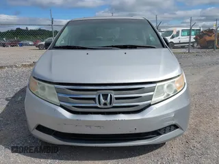 2012 Honda Odyssey EX-L with VIN 5FNRL5H63CB063815, listed as a IAAI auction lot 42302937 with 377,768 mi miles and . Bid and sale history available at DreamBid. Image 12.