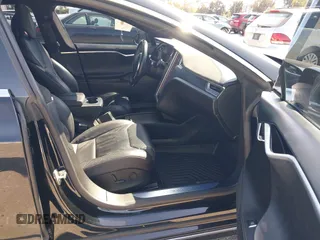 2017 Tesla Model S 100D with VIN 5YJSA1E21HF202591, listed as a IAAI auction lot 41983073 with 140,282 mi miles and . Bid and sale history available at DreamBid. Image 5.