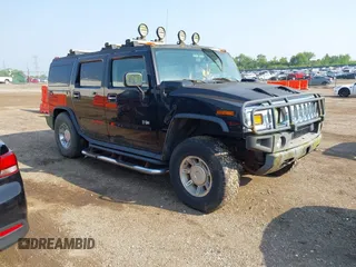 2004 Hummer H2 z VIN 5GRGN23U64H122135, wystawiony jako IAAI lot #42441112 z przebiegiem 128 182 mil mil oraz . Historia ofert i sprzedaży dostępna na DreamBid. Obrazek 1.
