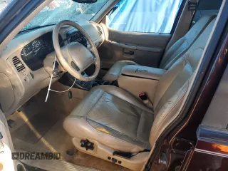 2000 Ford Explorer Eddie Bauer z VIN 1FMZU74E6YUB37521, wystawiony jako Copart lot #85994294 z przebiegiem 126 348 mil mil oraz Szkoda całkowita • Salvage title. Historia ofert i sprzedaży dostępna na DreamBid. Obrazek 7.