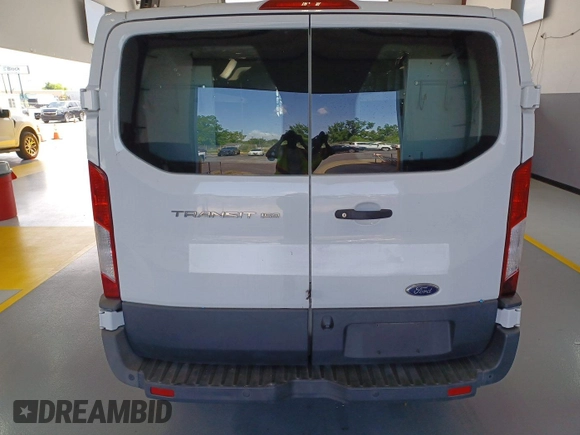 2018 Ford Transit with VIN 1FTYE1YM8JKB52177, listed as a IAAI auction lot 42564689 with 169,859 mi miles and . Bid and sale history available at DreamBid. Image 13.