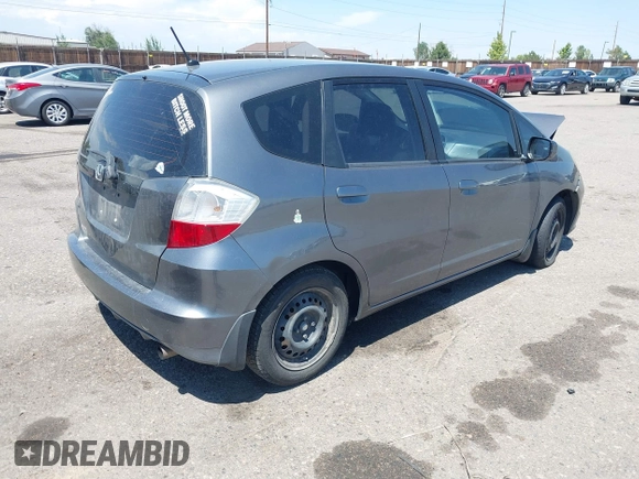 2013 Honda Fit with VIN JHMGE8H37DC023372, listed as a IAAI auction lot 40006280 with 117,791 mi miles. Bid and sale history available at carsss.com. Image 4.