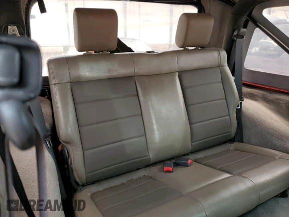 2009 Jeep Wrangler X z VIN 1J4FA24139L740959, wystawiony jako Copart lot #56509075 z przebiegiem 121 927 mil mil oraz Szkoda całkowita • Salvage title. Historia ofert i sprzedaży dostępna na DreamBid. Obrazek 10.