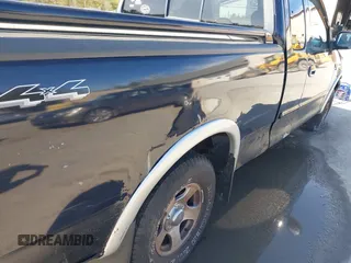 2001 Ford F-150 XL with VIN 2FTRX18L01CA83673, listed as a IAAI auction lot 41943618 with 130,717 mi miles. Bid and sale history available at carsss.com. Image 6.