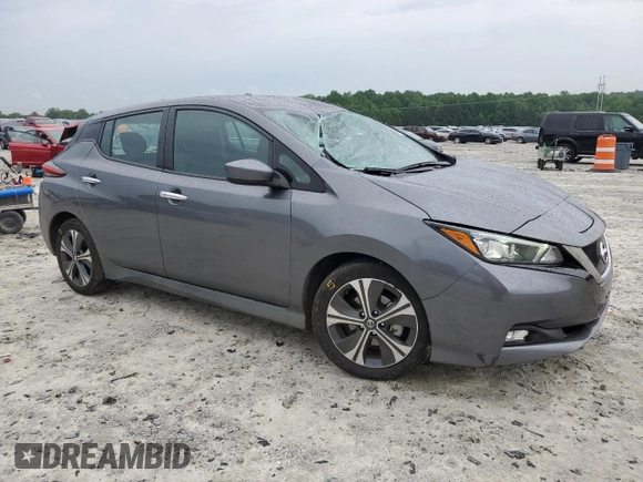 2018 Nissan LEAF SV with VIN 1N4AZ1CP1JC307031, listed as a Copart auction lot 58869215 with 99,621 mi miles and Salvage title. Bid and sale history available at DreamBid. Image 4.