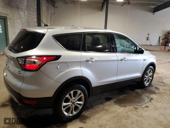 2017 Ford Escape SE with VIN 1FMCU9GD9HUC06111, listed as a Copart auction lot 54186185 with 85,998 mi miles and Salvage Title. Bid and sale history available at DreamBid. Image 3.