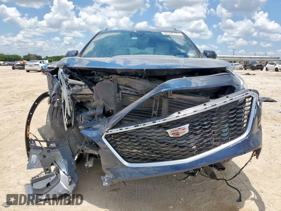 2020 Cadillac XT4 FWD Sport z VIN 1GYFZER40LF129760, wystawiony jako Copart lot #62592775 z przebiegiem 20 822 mil mil oraz Szkoda całkowita • Salvage title. Historia ofert i sprzedaży dostępna na DreamBid. Obrazek 5.