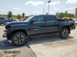 2021 Toyota Tacoma SR with VIN 3TMCZ5ANXMM431782, listed as a Copart auction lot 58767215 with 57,109 mi miles and Salvage title. Bid and sale history available at DreamBid. Image 1.