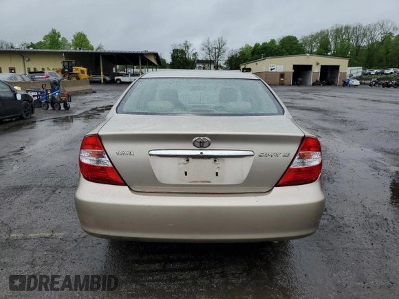 2002 Toyota Camry LE z VIN 4T1BE32K42U623283, wystawiony jako Copart lot #55631065 z przebiegiem 96 830 mil mil oraz Szkoda całkowita • Salvage title. Historia ofert i sprzedaży dostępna na DreamBid. Obrazek 6.